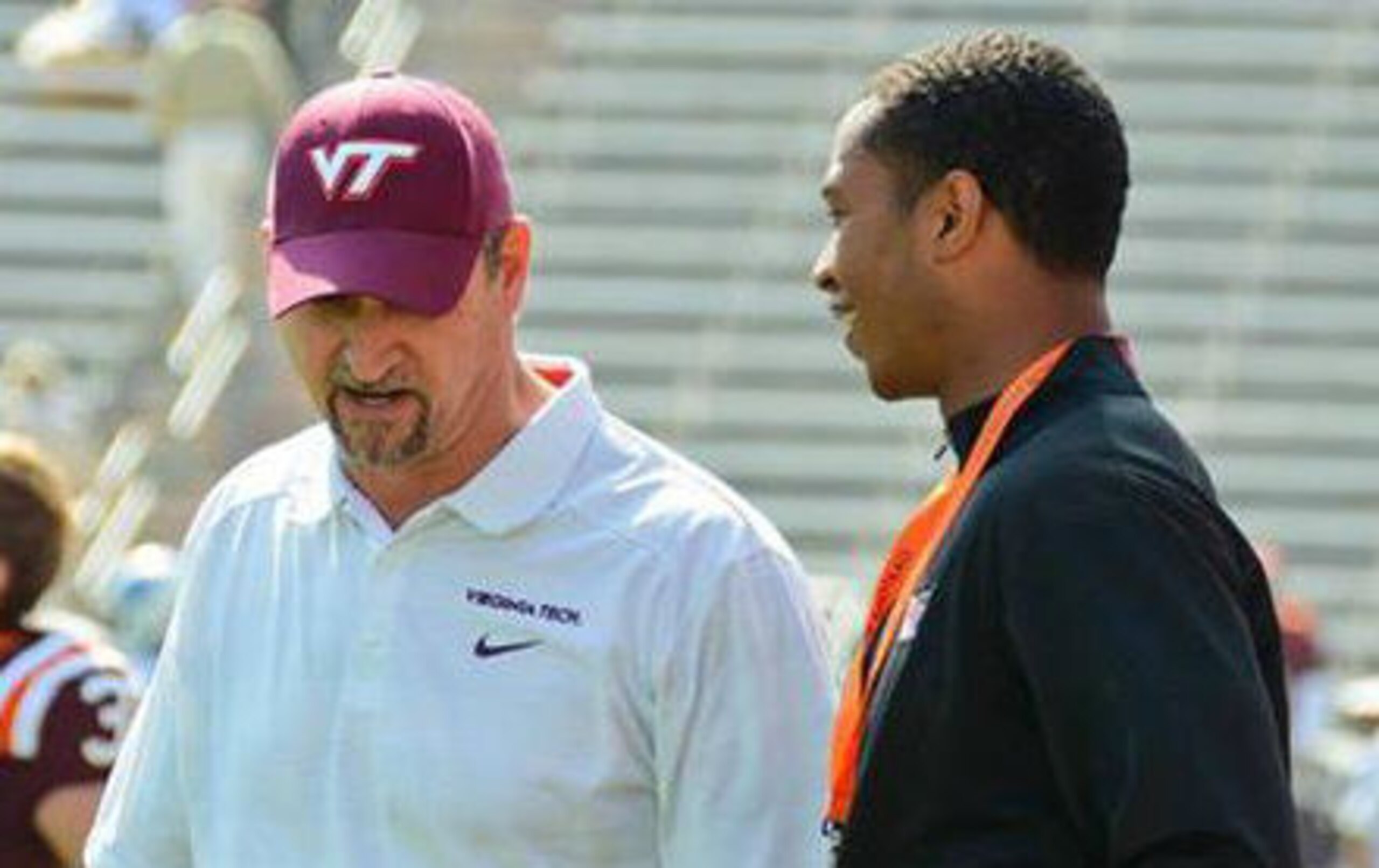 Virginia Tech defensive coordinator Bud Foster with potential future linebacker Raymon Minor