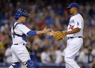 Federowicz congratulates Kenley Jansen after a save in 2013.