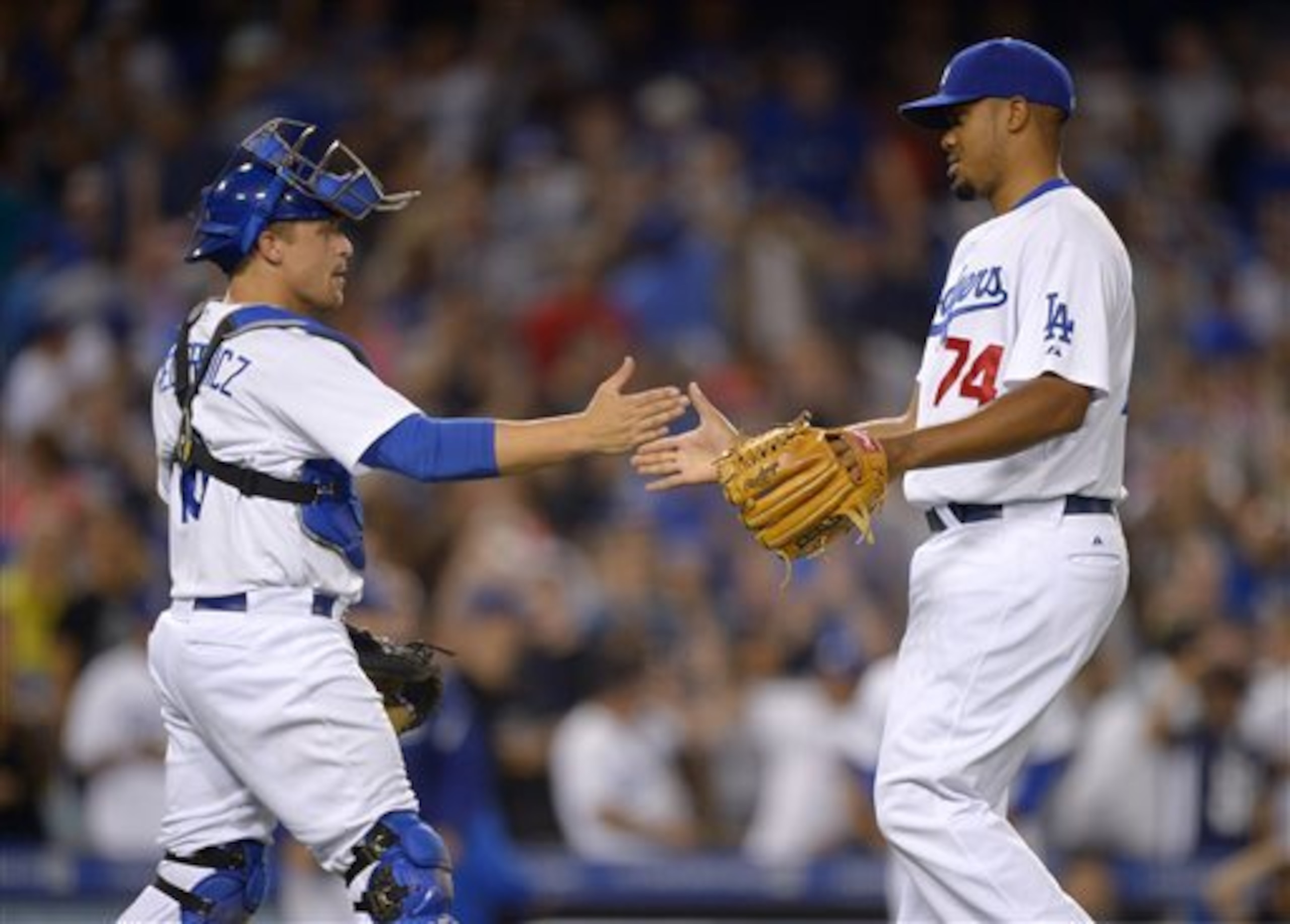 Federowicz congratulates Kenley Jansen after a save in 2013.