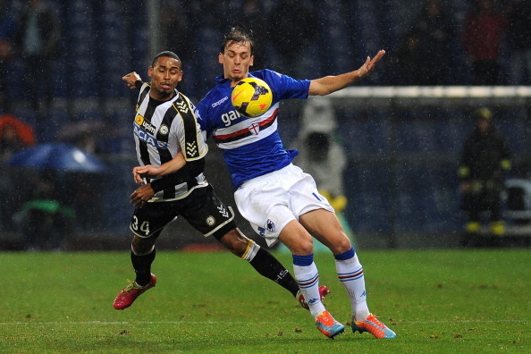 Manolo Gabbiadini battles with Udinese's Gabriel Silva.