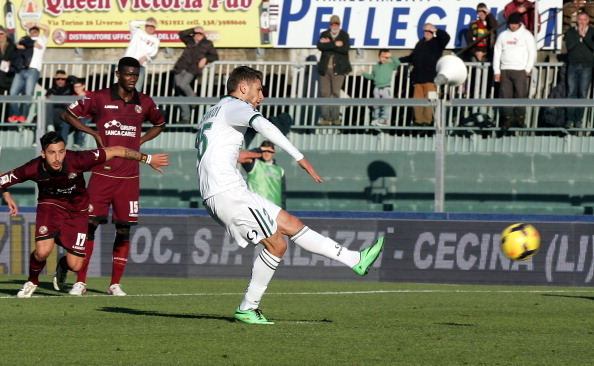 Domenico Berardi tucks in his 12th goal of the campaign against Livorno from the spot.