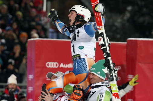 On top of the world: A jubilant Henrik Kristoffersen celebrates victory in the Schladming slalom, the teenager's first World Cup victory.