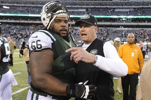 Jets head coach Rex Ryan (right) has some big decisions to make on upcoming free agents, including guard Willie Colon (left).