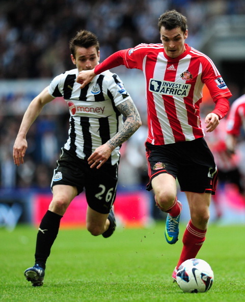 Adam Johnson (right)