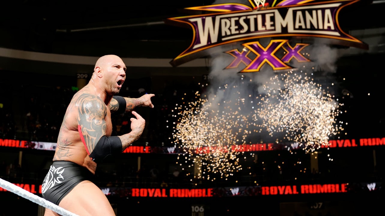 Batista celebrates his Rumble win.