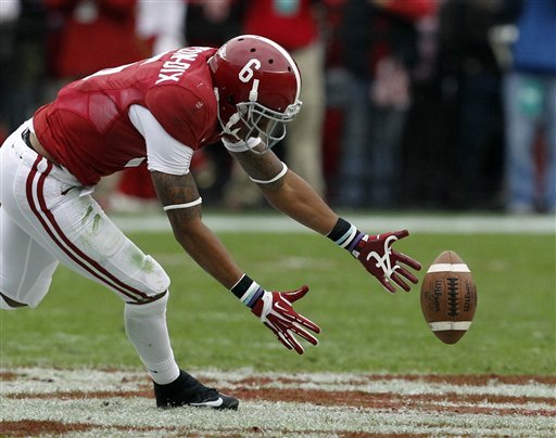 Alabama defensive back Ha Ha Clinton-Dix (6) tries to pick a loose ball after a blocked field goal attempt by Chattanooga during the first half of an NCAA college football game on Saturday, Nov. 23, 2012, in Tuscaloosa, Ala. (AP Photo/Butch Dill)