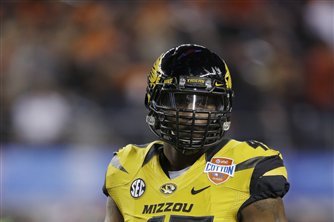 Missouri defensive lineman Kony Ealy (47) moves to the sideline against Oklahoma State during the first half of the Cotton Bowl NCAA college football game, Friday, Jan. 3, 2014, in Arlington, Texas.  (AP Photo/Tim Sharp)
