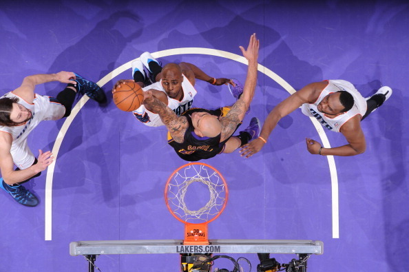 Robert Sacre is unable to tame the Bobcats