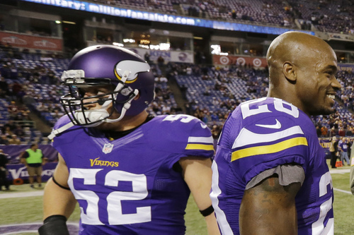 Running back Adrian Peterson (28) and linebacker Chad Greenway are the two highest-paid players on the Vikings' roster.