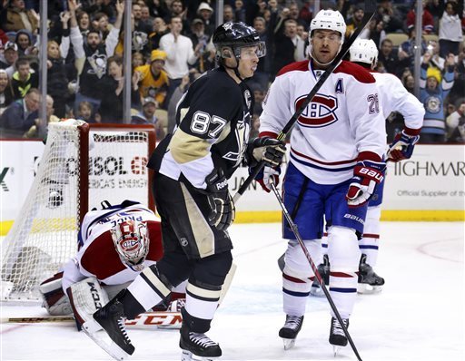 Pittsburgh Penguins forward Sidney Crosby and Montreal Canadiens defenseman Josh Gorges.