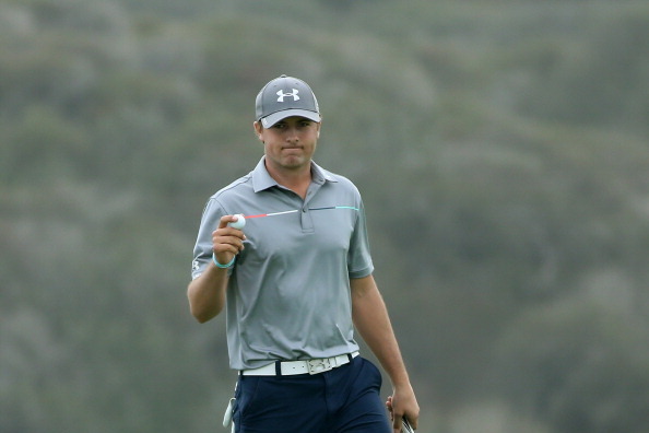 LA JOLLA, CA - JANUARY 26:  Jordan Spieth holds up his bal after making a birdie putt on the third hole during the final round of the Farmers Insurance Open on Torrey Pines South in La Jolla, California on January 26, 2014 in La Jolla, California.  (Photo
