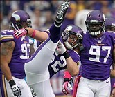 Outside linebacker Chad Greenway (center) recorded 134 tackles last season.