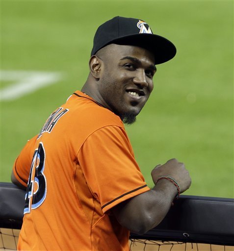 Marcell Ozuna should be all smiles as he made it through winter ball unaffected after left thumb injury.