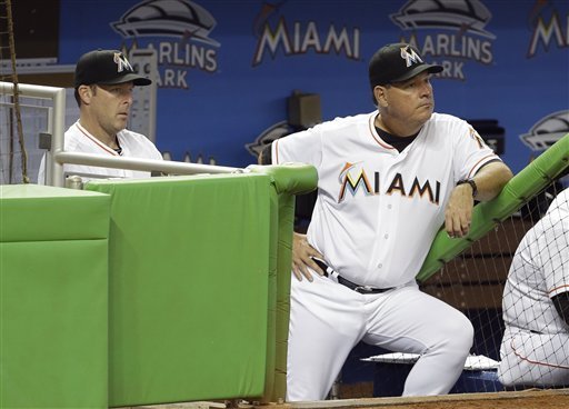 Chuck Hernandez, right, is returning to Marlins manager Mike Redmond's staff as pitching coach. But what changes did Redmond make to his coaching staff for 2014?