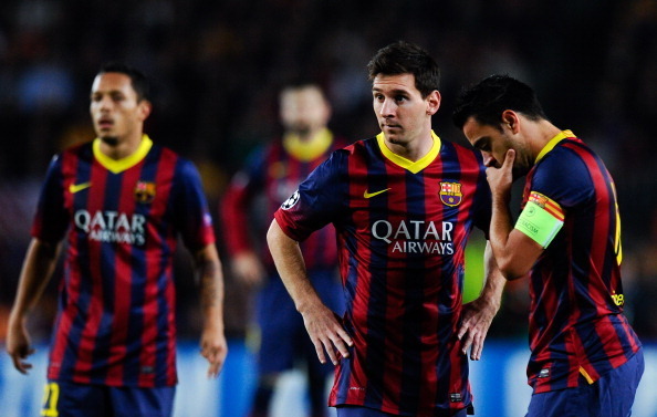 Xavi (right), at 34, could do with a youthful accomplice