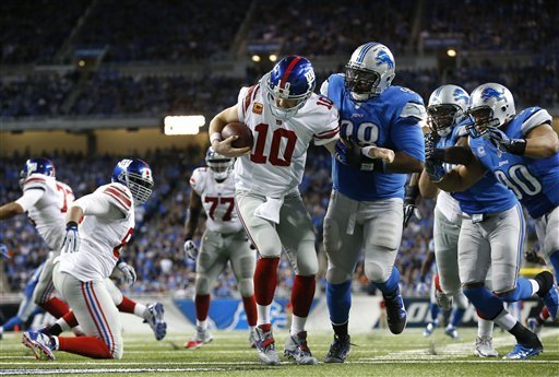 QB Eli Manning couldn't escape the rush in 2013.