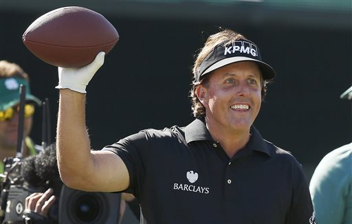 Phil Mickelson shows off his passing form in Phoenix.