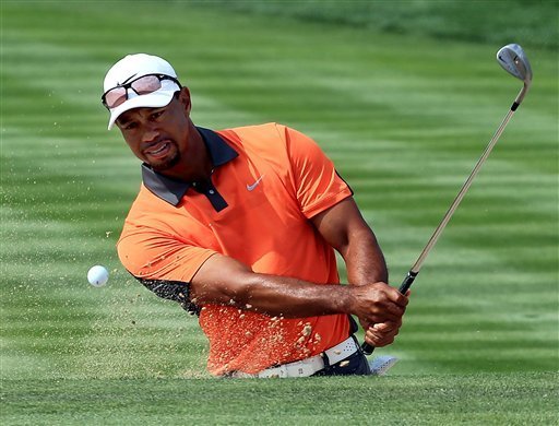 Errant drives put stress on Tiger Woods' short game in Dubai.