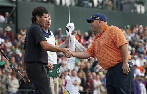 Bubba Watson congratulated Kevin Stadler on the win at the Waste Management Phoenix Open.