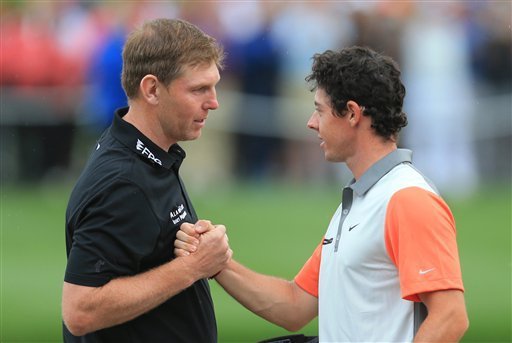 Rory McIlroy congratulates Stephen Gallacher after their round on Sunday at Dubai.