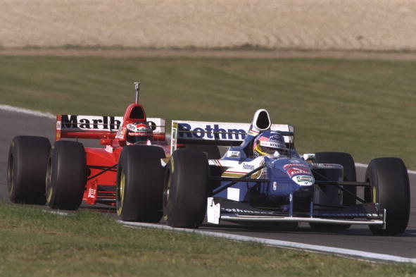 Villeneuve and Schumacher at the Nurburgring in 1997.