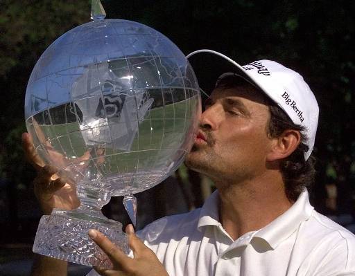 Carlos Franco gives his Greater Milwaukee Open a little love in 1999.