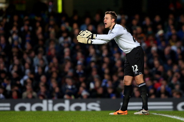 LONDON, ENGLAND - DECEMBER 29:  Goalkeeper Simon Mignolet of Liverpool directs his defence during the Barclays Premier League match between Chelsea and Liverpool at Stamford Bridge on December 29, 2013 in London, England.  (Photo by Julian Finney/Getty Im