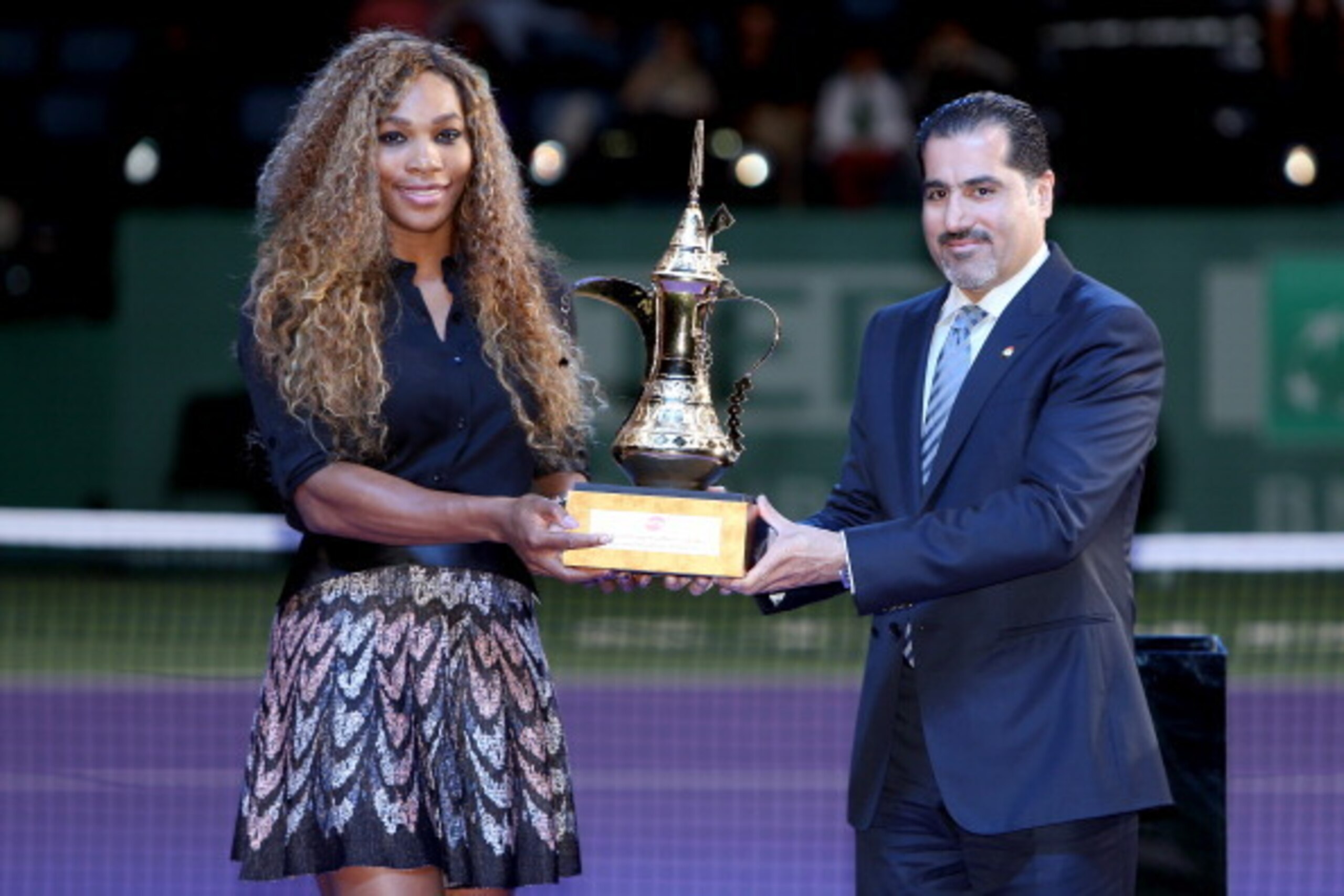 Serena Williams accepts a trophy at 2013 WTA Championships Serena Williams accepts a trophy at 2013 WTA Championships