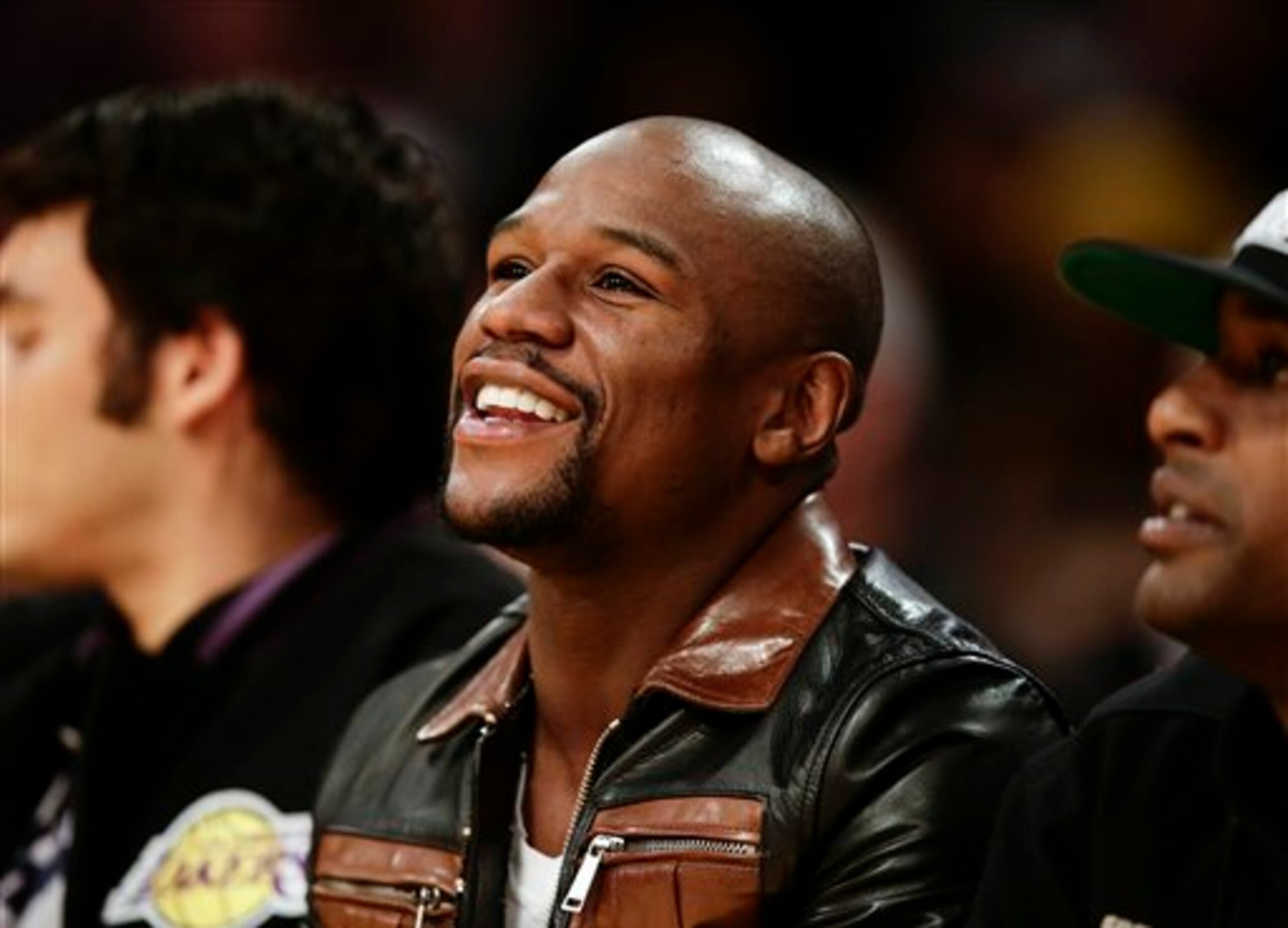 Floyd has millions of reasons to smile, and he says he'll let the fans select his next foe.