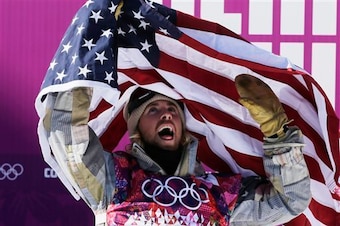 Sage Kotsenburg celebrates his snowboard slopestyle victory.