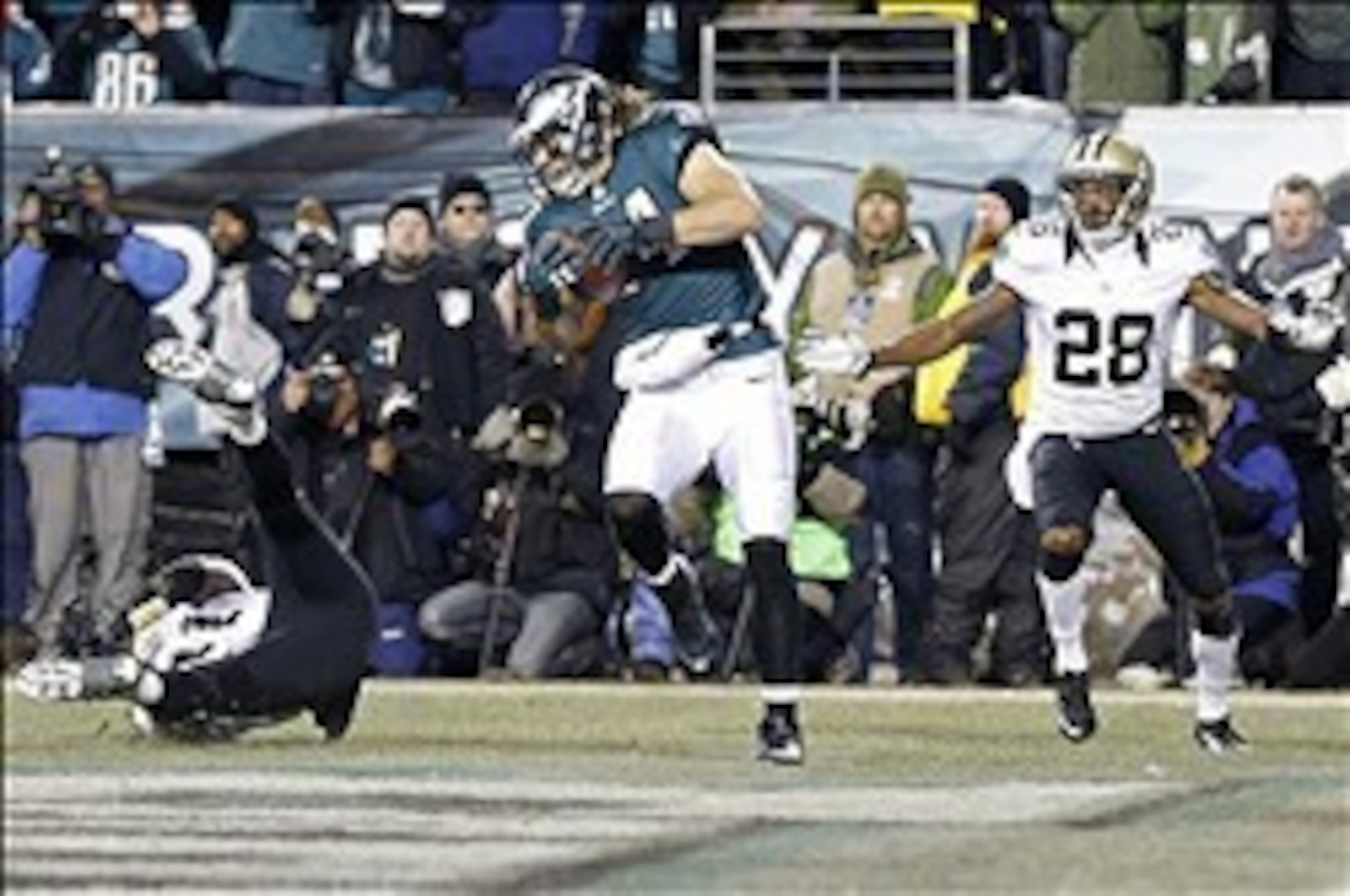 Riley Cooper catches this touchdown pass against the Saints in the NFC playoffs.