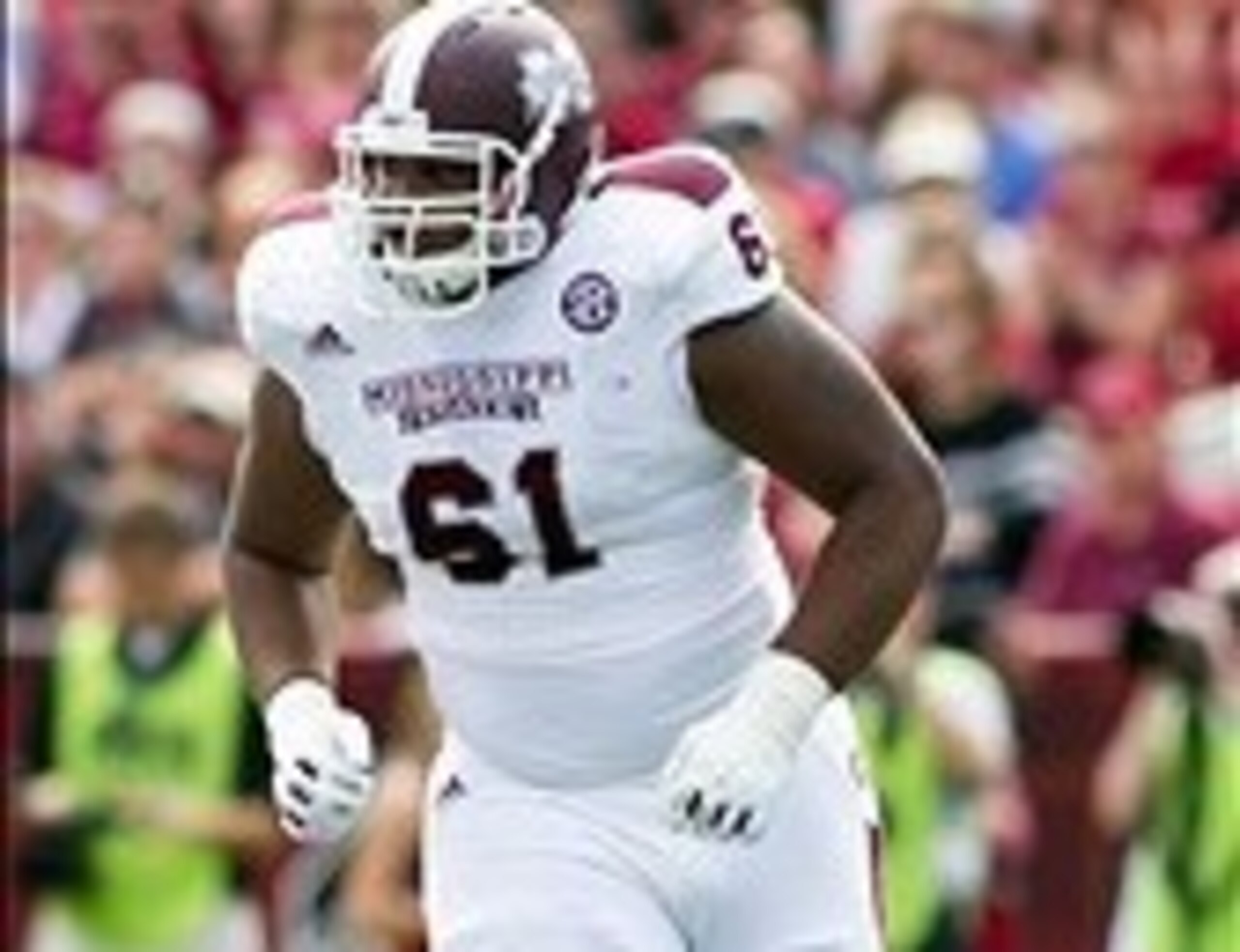 Nov 2, 2013; Columbia, SC, USA; Mississippi State Bulldogs offensive linesman Gabe Jackson (61) in the game against the South Carolina Gamecocks at Williams-Brice Stadium. The Gamecocks defeated the Bulldogs 34-16.  Mandatory Credit: Jeremy Brevard-USA TO