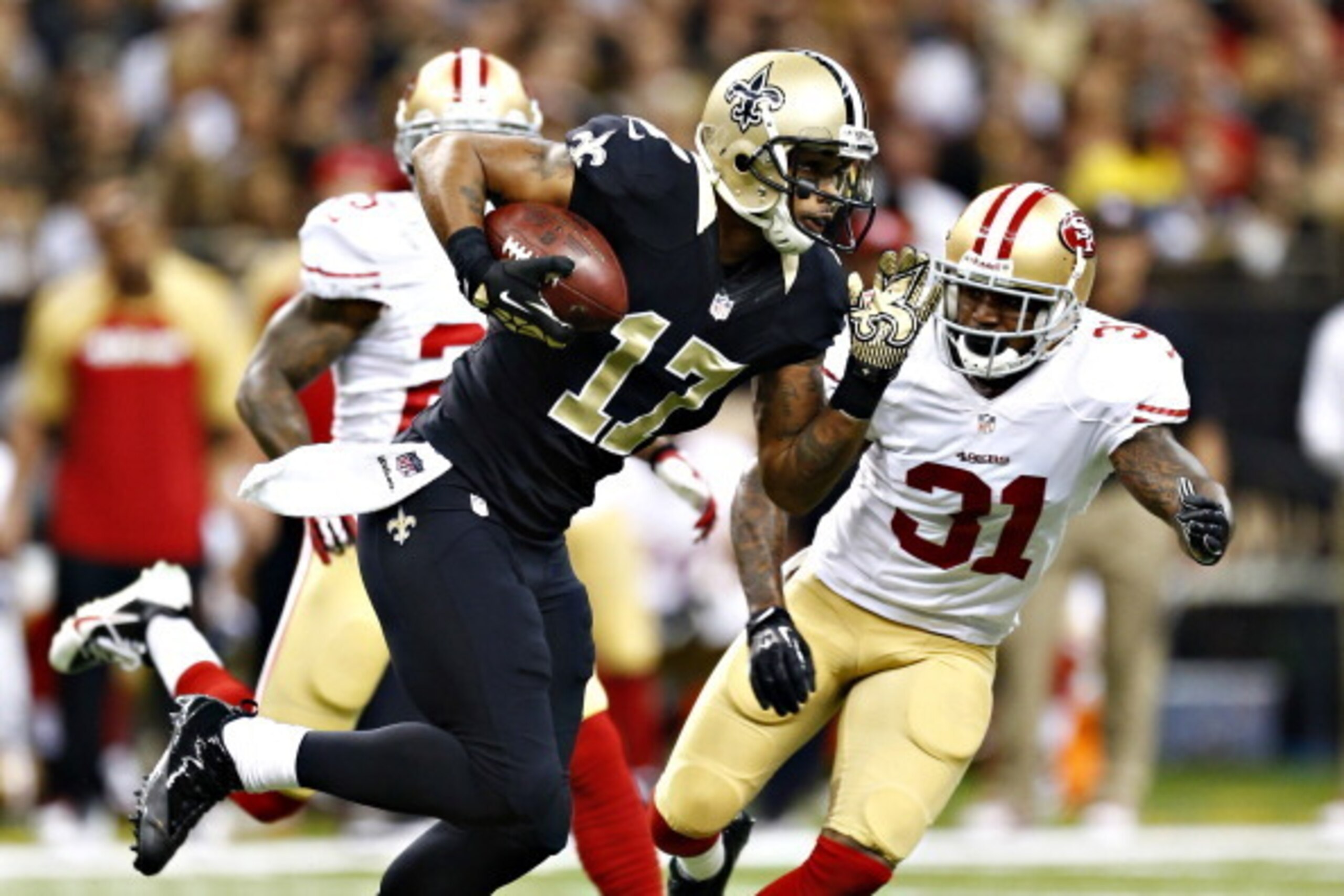 Robert Meachem battles against 49ers safety Donte Whitner (No. 31) earlier this season.