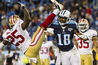 NASHVILLE, TN - OCTOBER 20:  Kenny Britt #18 of the Tennessee Titans pushes over Tarell Brown #25 of the San Francisco 49ers at LP Field on October 20, 2013 in Nashville, Tennessee.  The 49ers defeated the Titans 31-17.  (Photo by Wesley Hitt/Getty Images