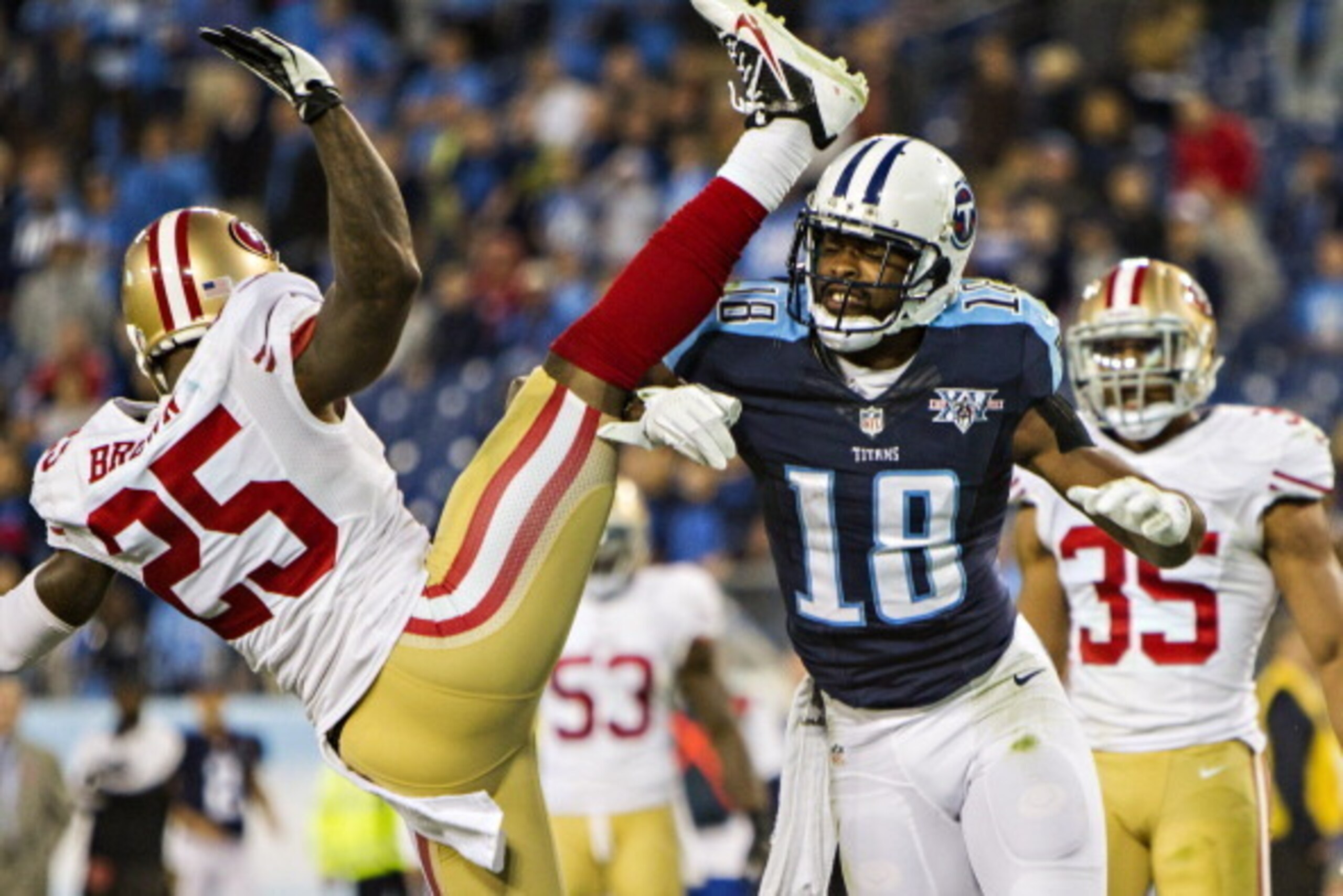 NASHVILLE, TN - OCTOBER 20:  Kenny Britt #18 of the Tennessee Titans pushes over Tarell Brown #25 of the San Francisco 49ers at LP Field on October 20, 2013 in Nashville, Tennessee.  The 49ers defeated the Titans 31-17.  (Photo by Wesley Hitt/Getty Images