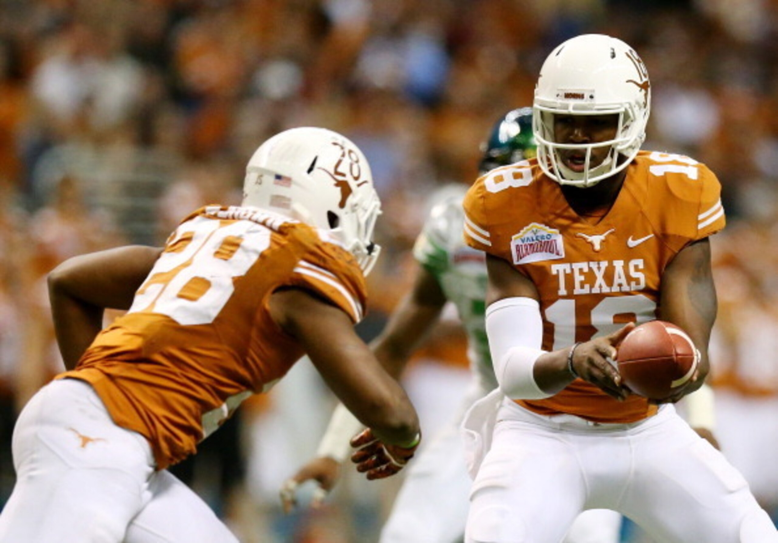At 6'4" and 245 pounds, Swoopes (right) is a quarterback in a defensive end's body.