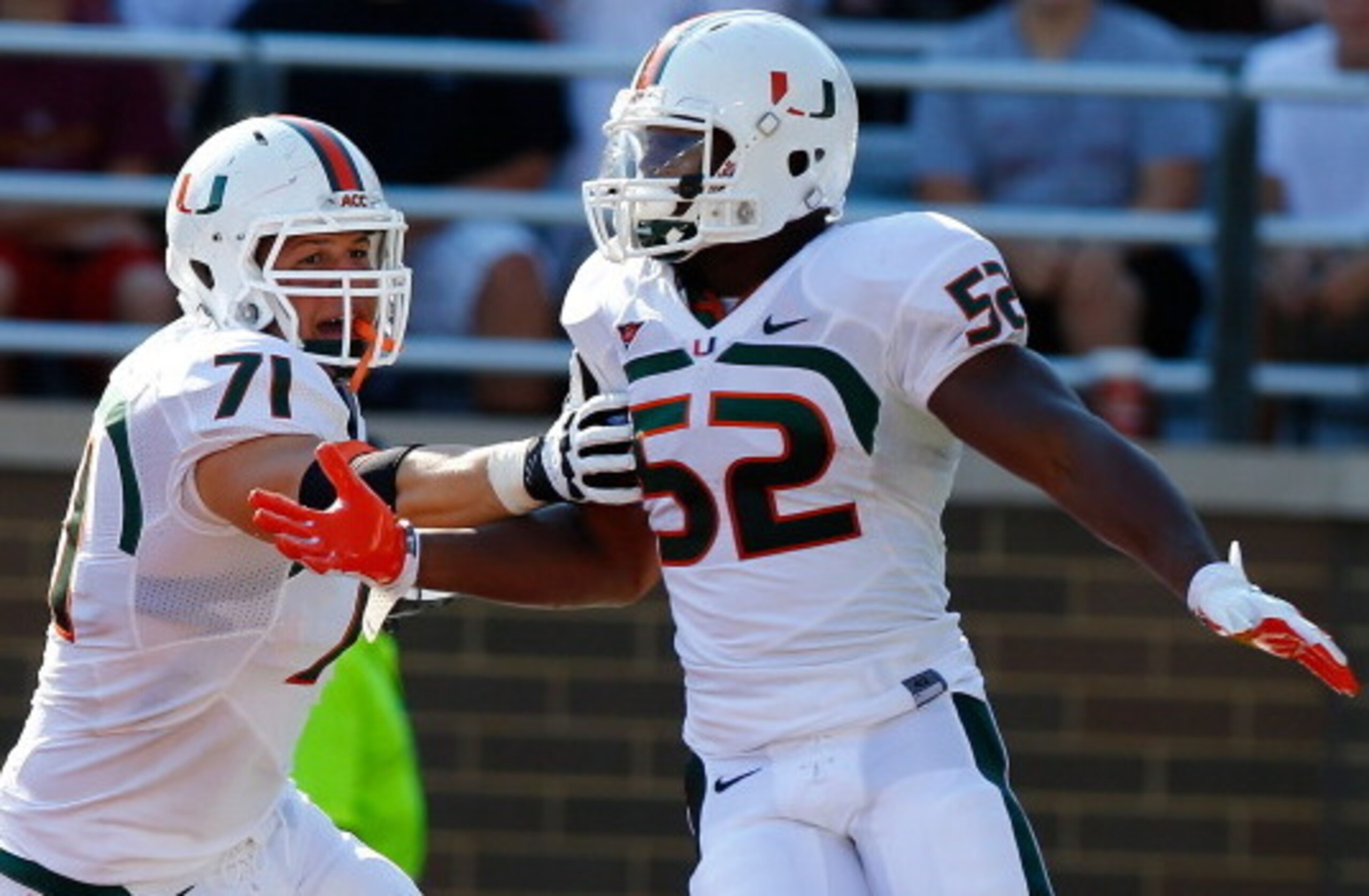 The return of Anthony Chickillo (71) and Denzel Perryman (52) will help Miami's defense take a step forward this fall.