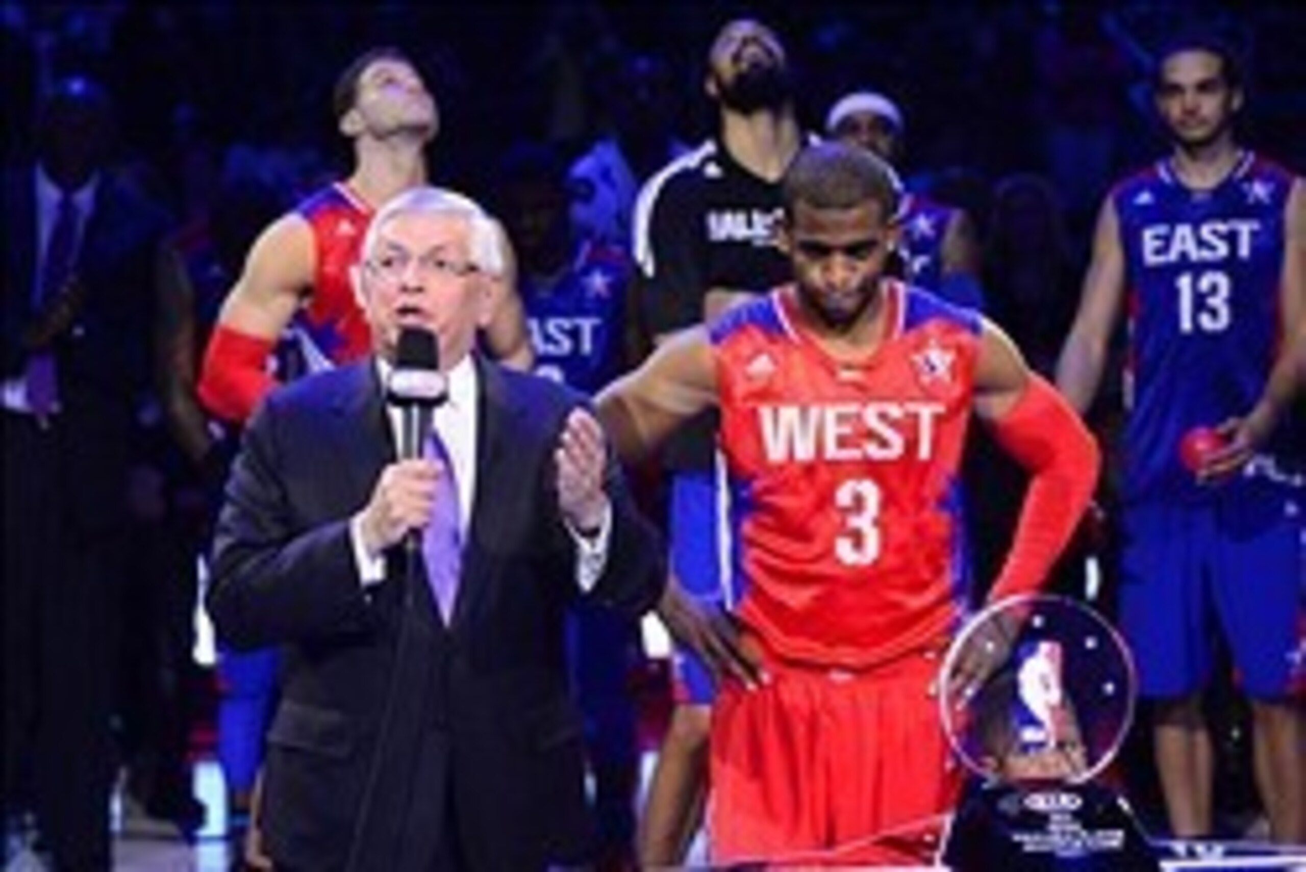 Feb 17, 2013; Houston, TX, USA; NBA commissioner David Stern (left) speaks before awarding Western Conference guard Chris Paul (3) of the Los Angeles Clippers with the game MVP trophy after the 2013 NBA all star game at the Toyota Center. West won 143-138