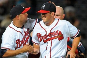 Alex Wood is congratulated after a successful outing.