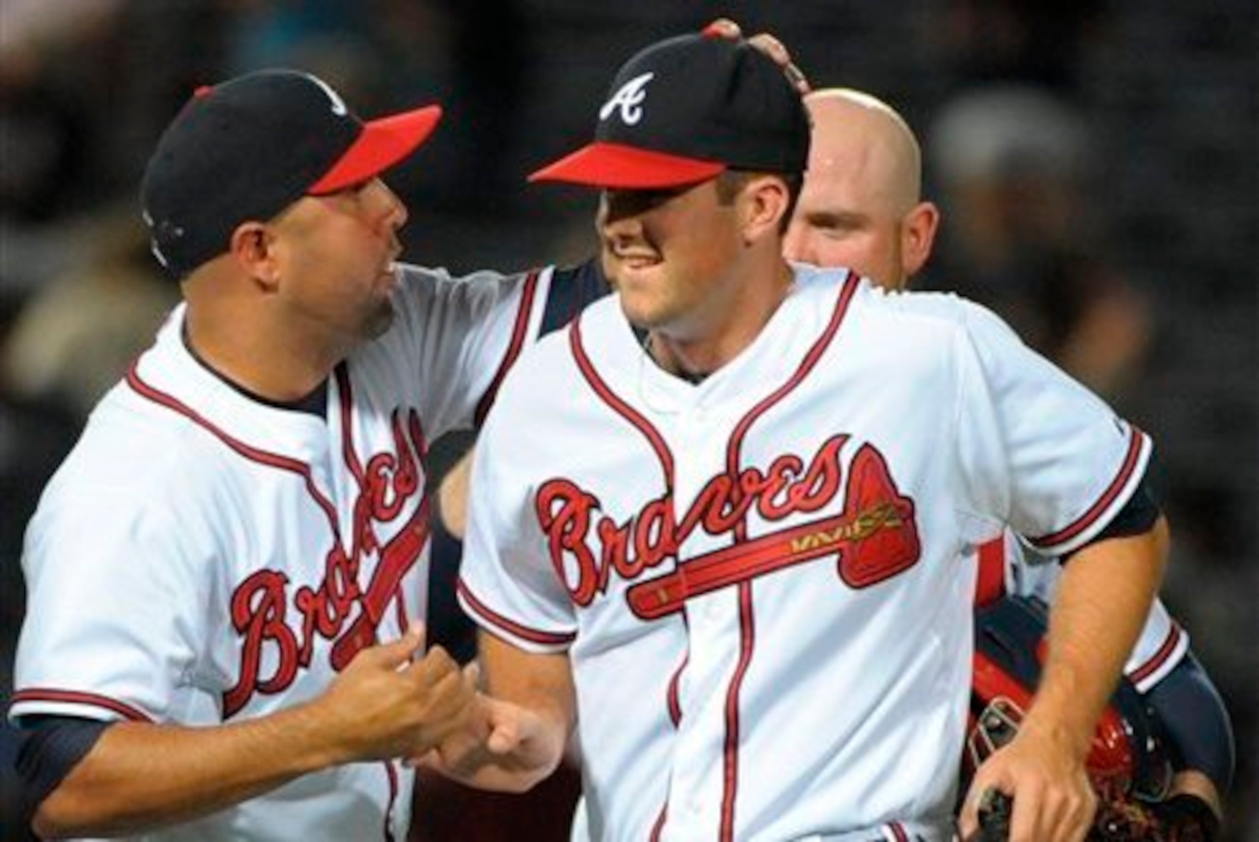 Alex Wood is congratulated after a successful outing.