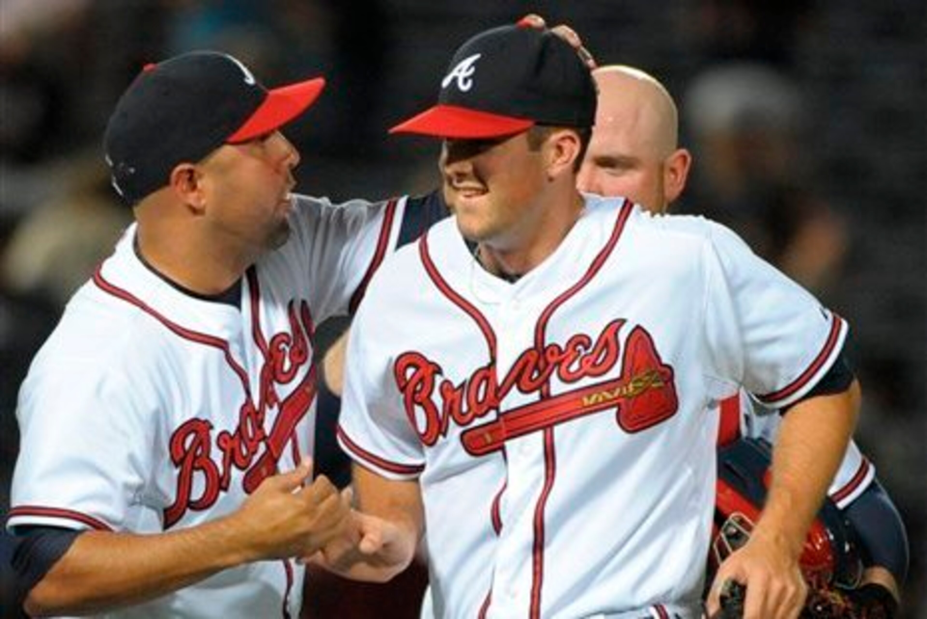 Alex Wood is congratulated after a successful outing.