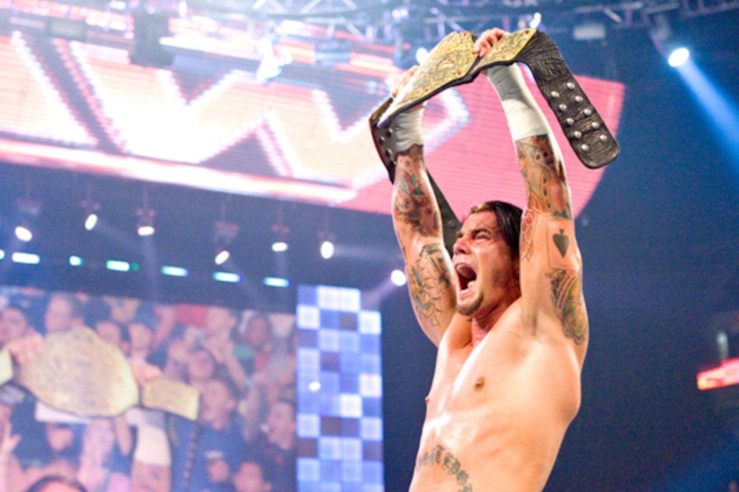 CM Punk as World Heavyweight Champion. CM Punk as World Heavyweight Champion.