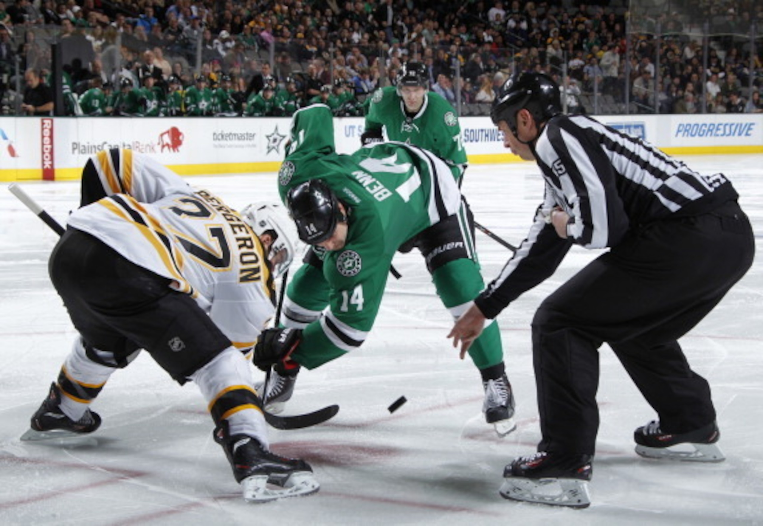 Patrice Bergeron takes an important defensive faceoff.