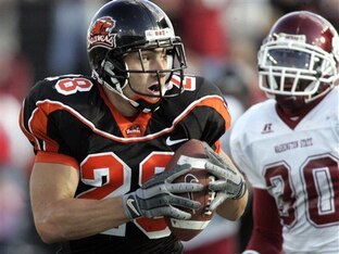 Hass (left) had a stellar career with the Beavers.