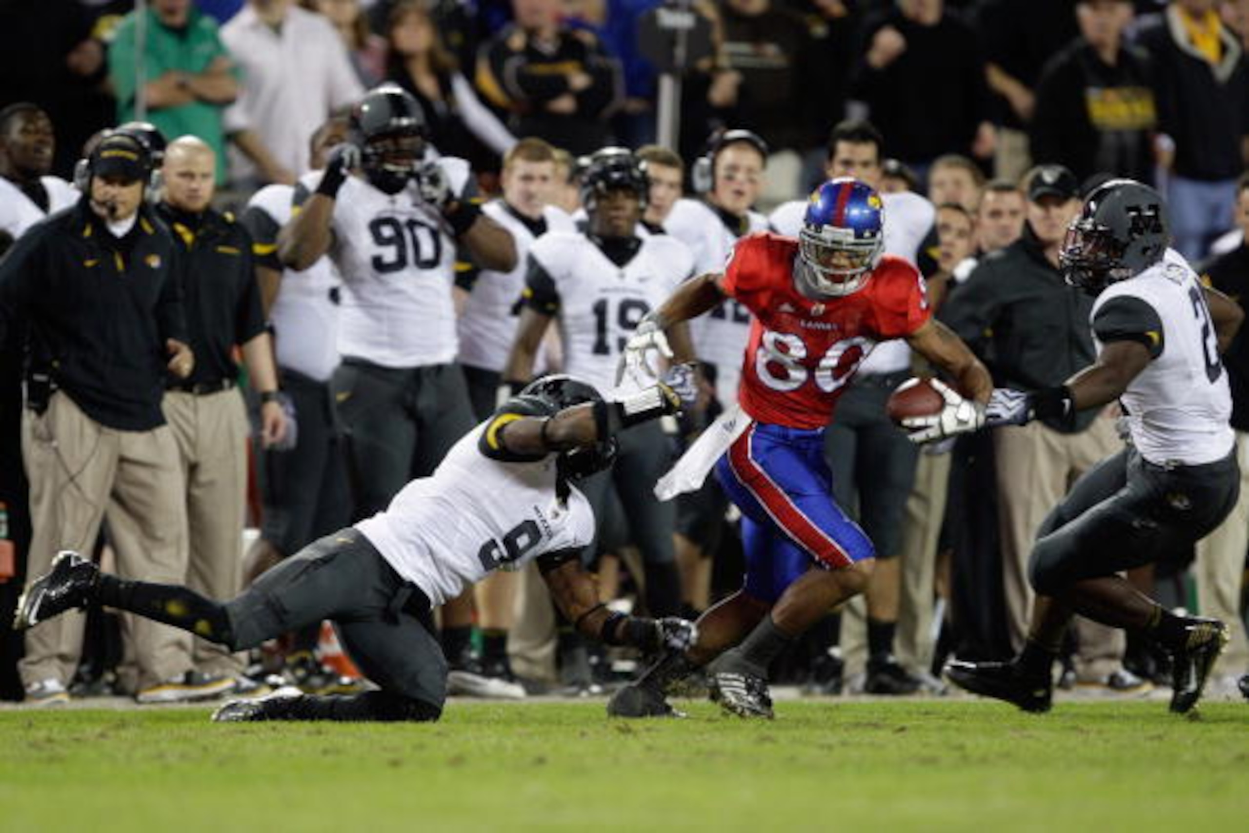 Briscoe (center) had a fantastic career with Kansas.