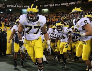 Who will replace #77 Taylor Lewan?