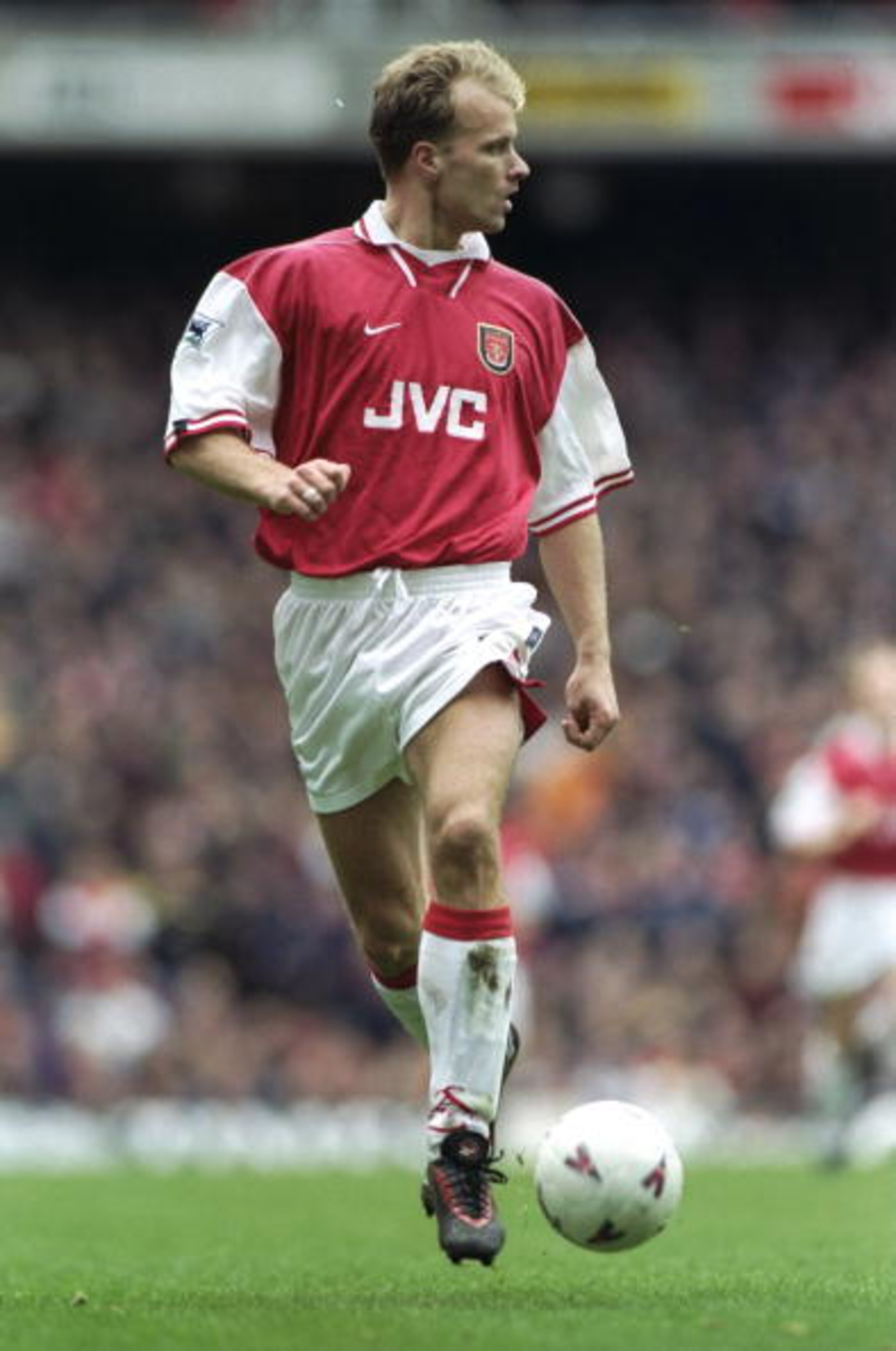 26 Dec 1997:  Dennis Bergkamp of Arsenal looks up during the FA Carling Premiership match against Leicester City at Highbury Stadium in London. Arsenal won 2-1. \ Mandatory Credit: Shaun Botterill /Allsport