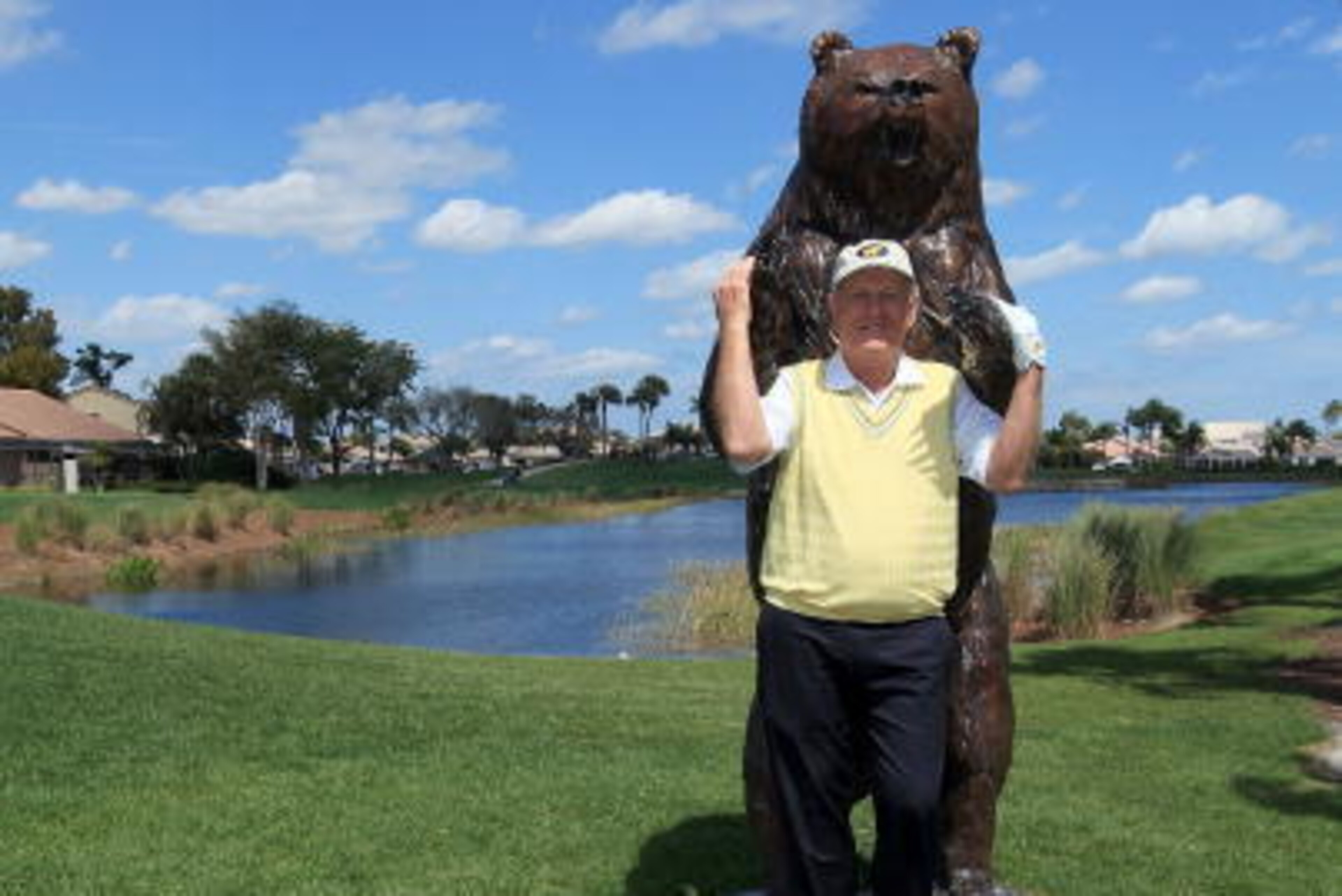 PALM BEACH GARDENS, FL - MARCH 15: Jack Nicklaus poses with the bear on the 15th tee that signifies the final four holes known as the 'Bear Trap' on the Champion Course during the Els for Autism Pro-Am on the Champions Course at the PGA National Golf Club