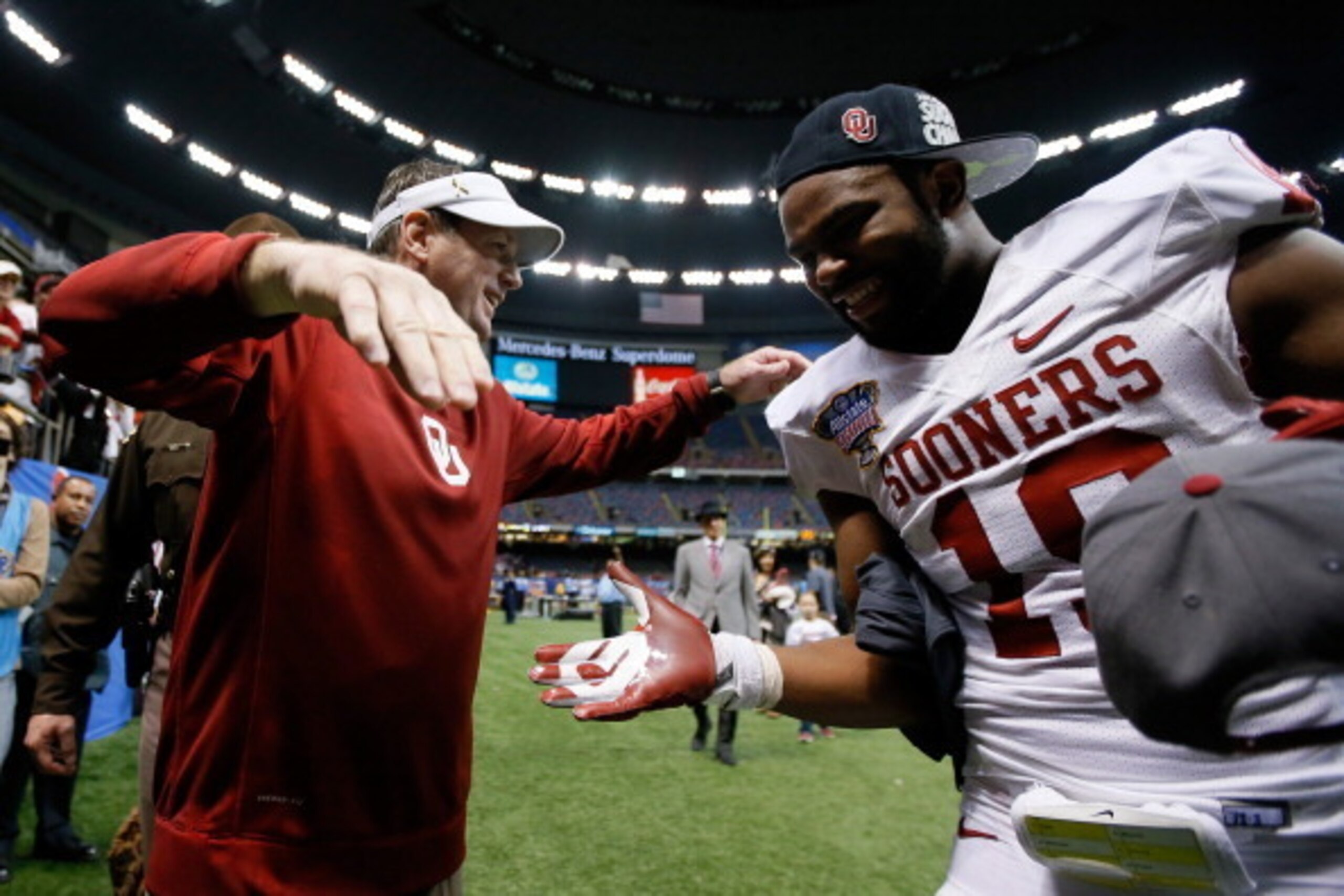 Striker (right) will be a key part of Oklahoma's D in 2014.