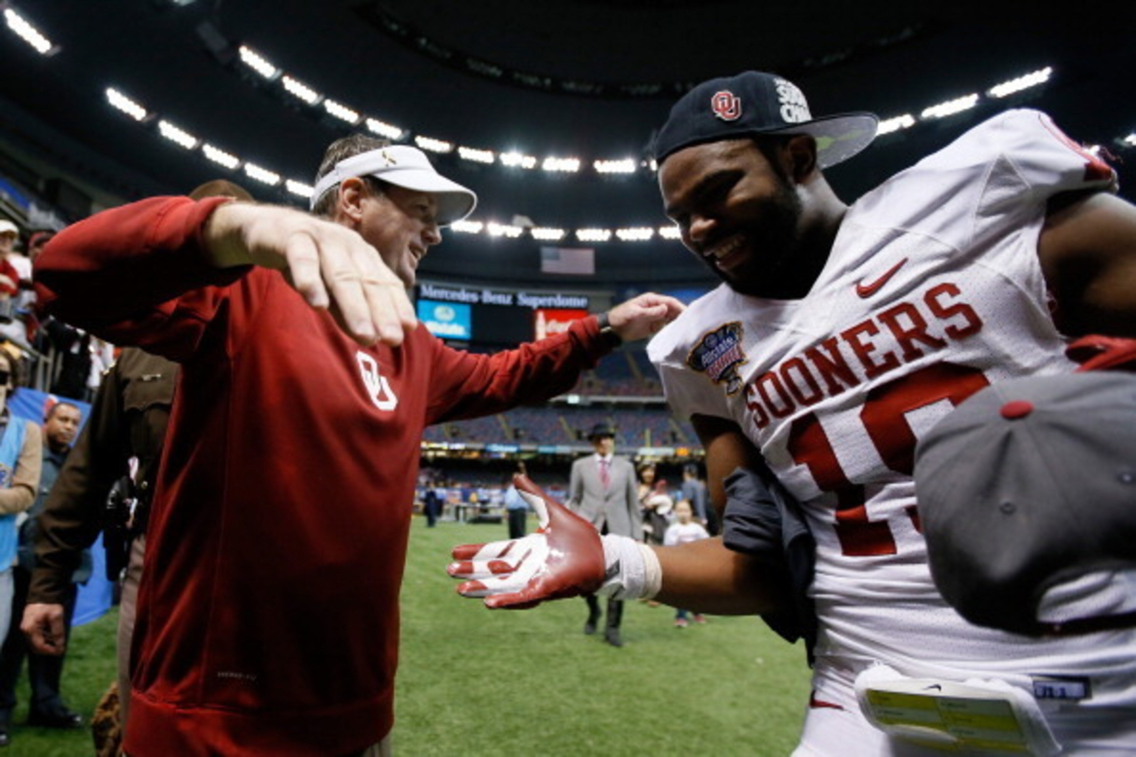 Striker (right) will be a key part of Oklahoma's D in 2014.
